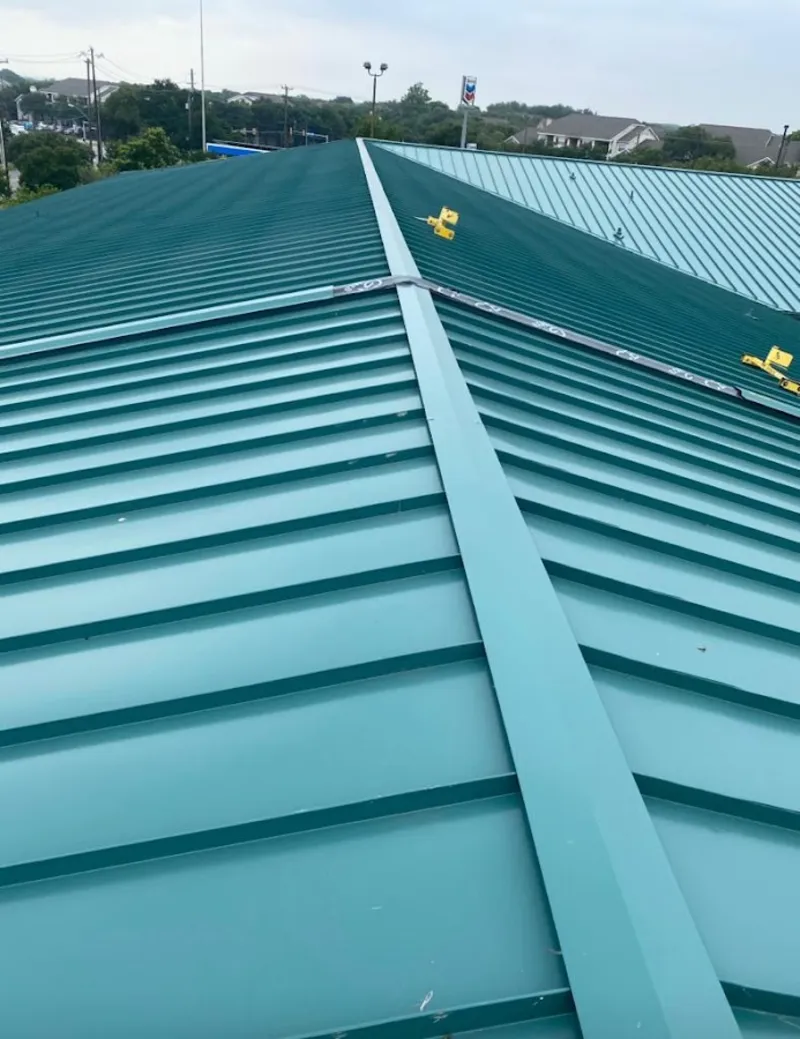 Green commercial metal roof ridge and valley for Metal Roof Repair in Live Oak